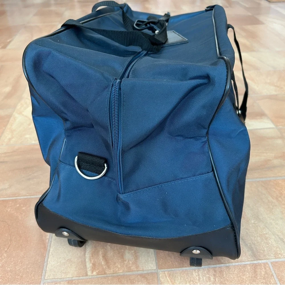 NWOT Calvin Klein Blue & Black Canvas Travel Duffel Bag with Wheels